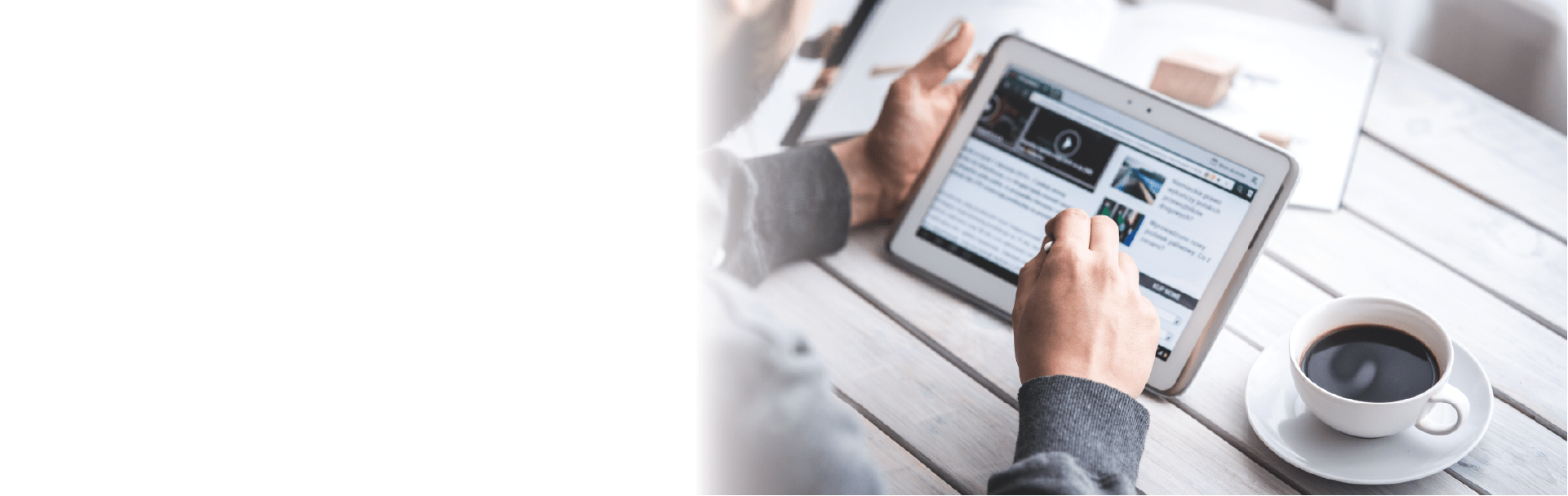 man with tablet and coffee